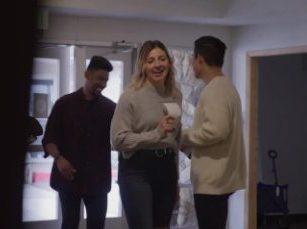People greeting each other in a church lobby